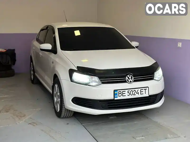 Седан Volkswagen Polo 2011 1.6 л. Автомат обл. Николаевская, Николаев - Фото 1/21