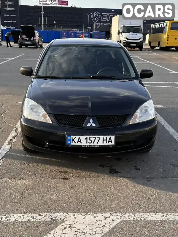 Седан Mitsubishi Lancer 2009 1.6 л. Автомат обл. Київська, Київ - Фото 1/21