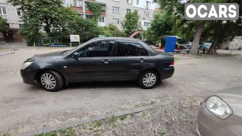 Седан Mitsubishi Lancer 2004 1.6 л. Автомат обл. Киевская, Киев - Фото 1/17