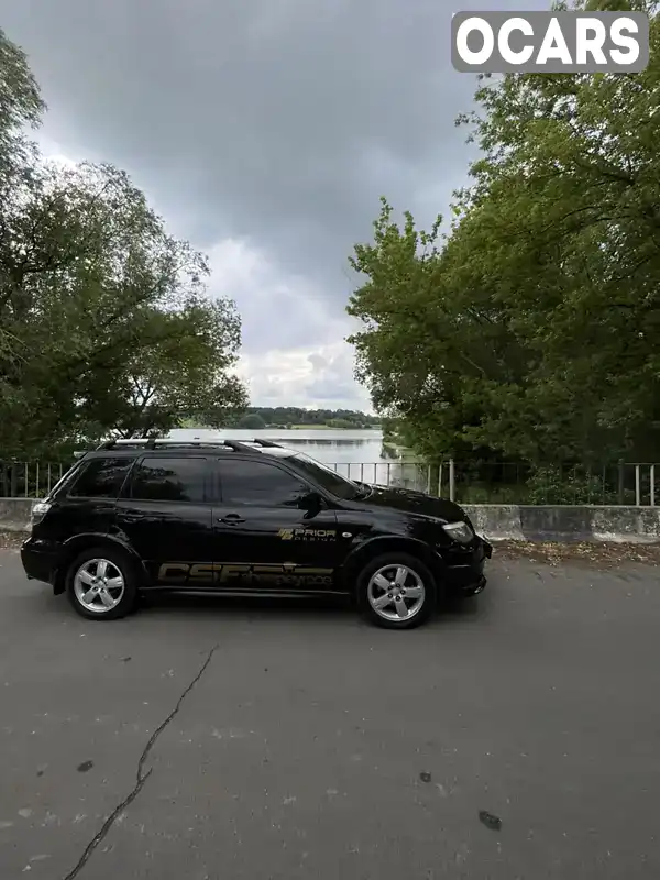 Позашляховик / Кросовер Mitsubishi Outlander 2006 2 л. Ручна / Механіка обл. Рівненська, Рівне - Фото 1/16