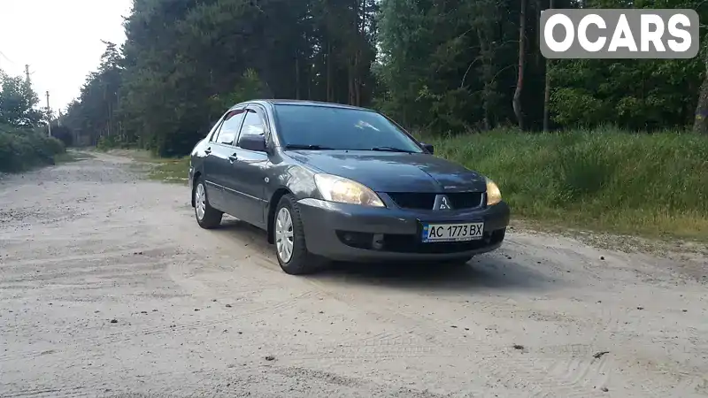 Седан Mitsubishi Lancer 2009 1.58 л. Ручна / Механіка обл. Київська, Київ - Фото 1/21