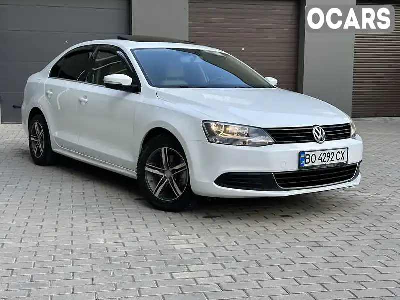 Седан Volkswagen Jetta 2014 1.8 л. Автомат обл. Хмельницька, Хмельницький - Фото 1/21