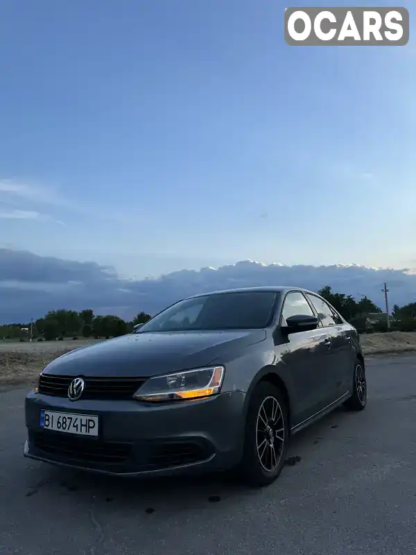 Седан Volkswagen Jetta 2013 1.8 л. Автомат обл. Полтавская, Горишние Плавни (Комсомольск) - Фото 1/21