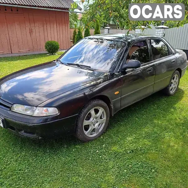 Седан Mazda 626 1993 2 л. Ручная / Механика обл. Черновицкая, Черновцы - Фото 1/9