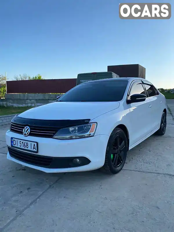 Седан Volkswagen Jetta 2012 2.48 л. Автомат обл. Київська, Біла Церква - Фото 1/19