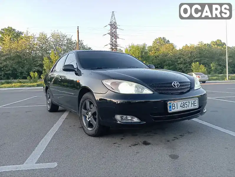 Седан Toyota Camry 2003 3 л. обл. Харьковская, Харьков - Фото 1/15