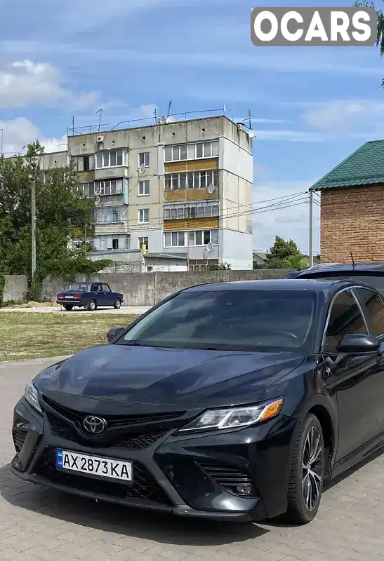 Седан Toyota Camry 2018 2.49 л. Автомат обл. Ровенская, Ровно - Фото 1/21