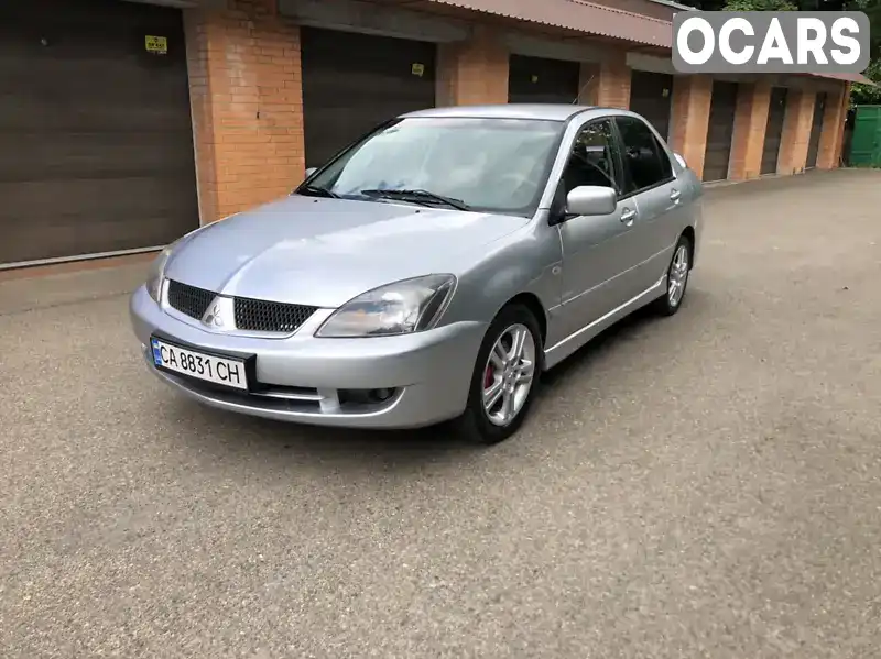 Седан Mitsubishi Lancer 2006 2 л. Ручна / Механіка обл. Черкаська, Сміла - Фото 1/21