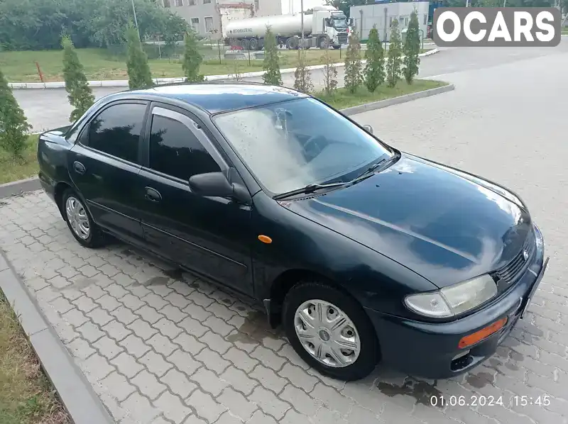 Седан Mazda 323 1995 null_content л. Ручна / Механіка обл. Тернопільська, Гусятин - Фото 1/12