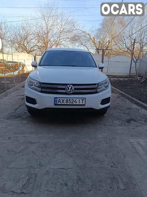 Внедорожник / Кроссовер Volkswagen Tiguan 2014 1.98 л. Автомат обл. Харьковская, Сахновщина - Фото 1/17