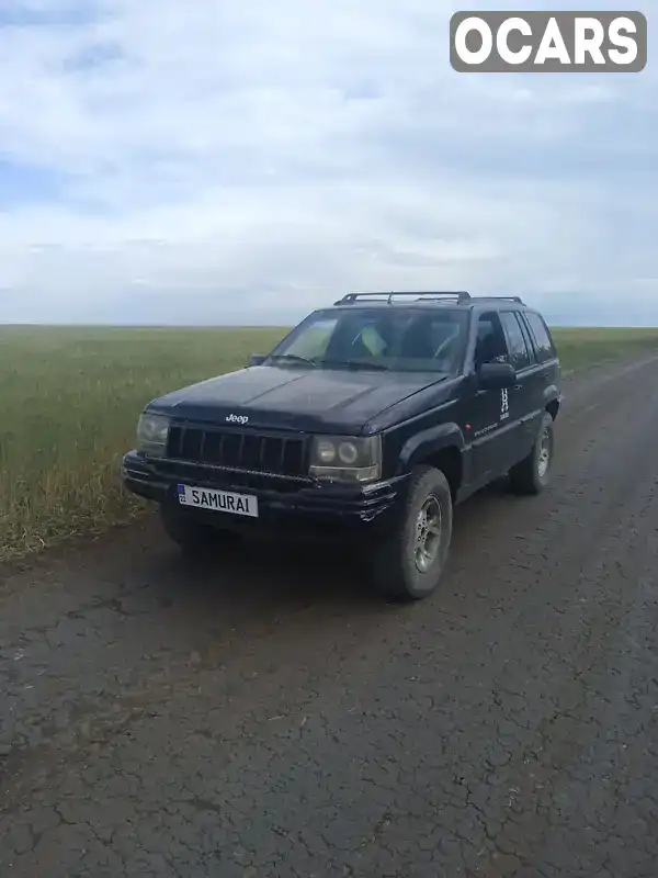 Позашляховик / Кросовер Jeep Grand Cherokee 1994 5.2 л. Автомат обл. Херсонська, Херсон - Фото 1/10