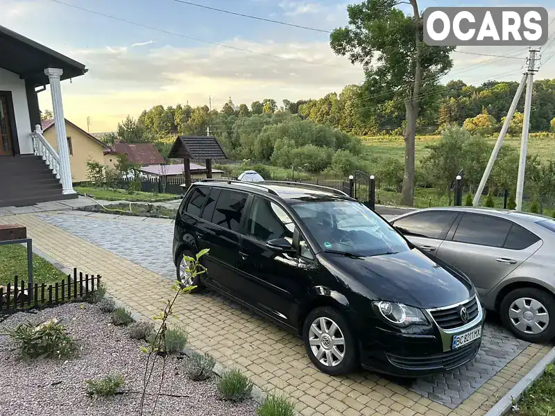 Минивэн Volkswagen Touran 2009 1.97 л. Ручная / Механика обл. Львовская, Львов - Фото 1/21