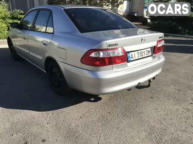 Седан Mazda 626 2000 2 л. Ручная / Механика обл. Винницкая, Ладыжин - Фото 1/21