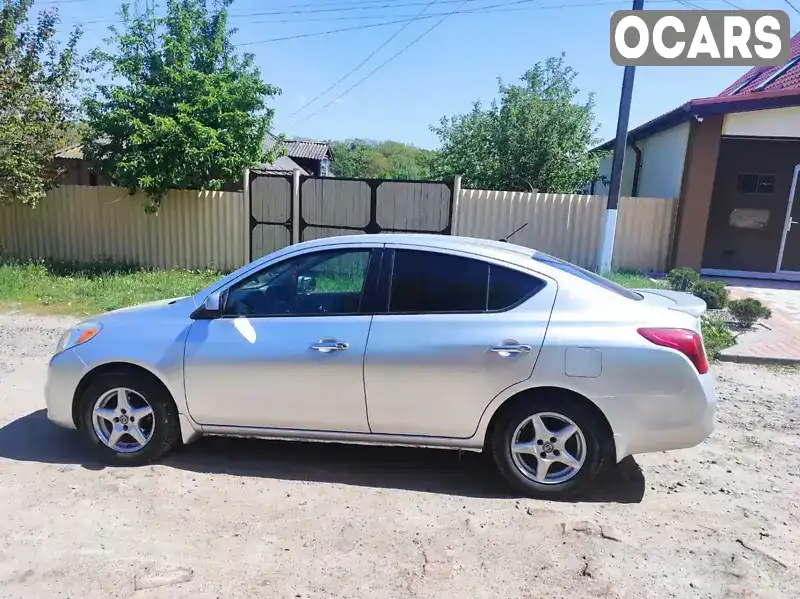 Седан Nissan Versa 2013 1.6 л. Вариатор обл. Харьковская, Харьков - Фото 1/14