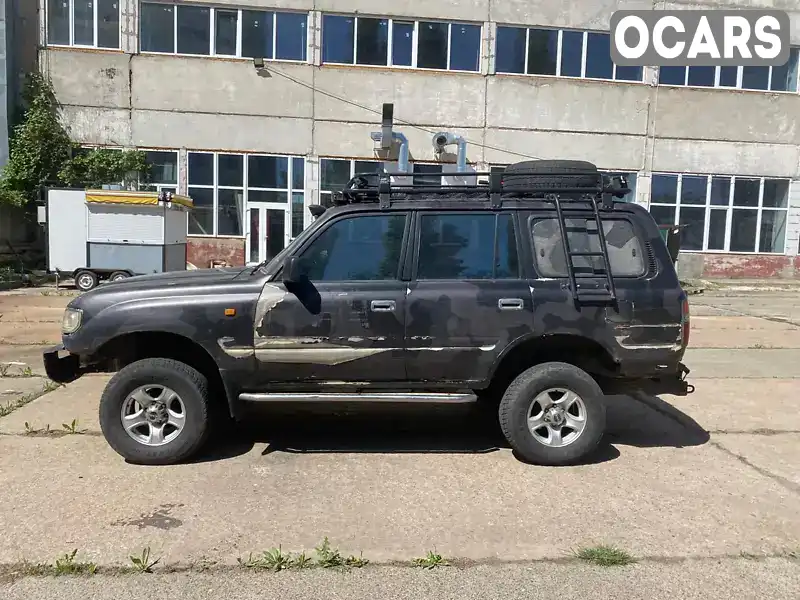 Позашляховик / Кросовер Toyota Land Cruiser 1993 4.2 л. Ручна / Механіка обл. Харківська, Харків - Фото 1/5