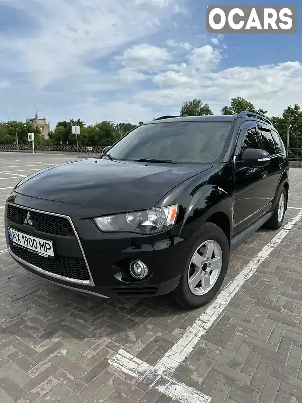 Внедорожник / Кроссовер Mitsubishi Outlander 2011 2 л. Автомат обл. Харьковская, Харьков - Фото 1/12