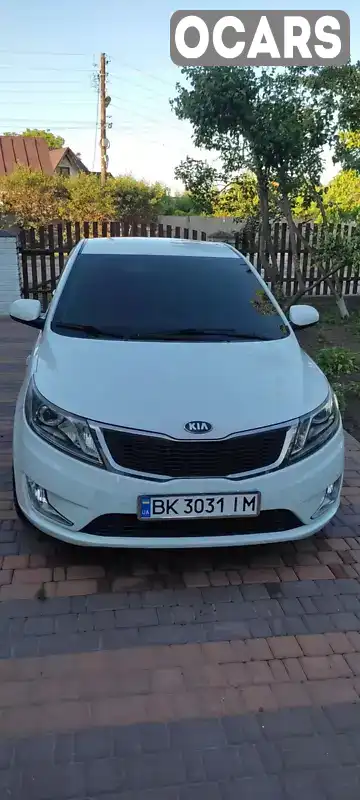 Седан Kia Rio 2013 1.4 л. Автомат обл. Ровенская, Острог - Фото 1/21