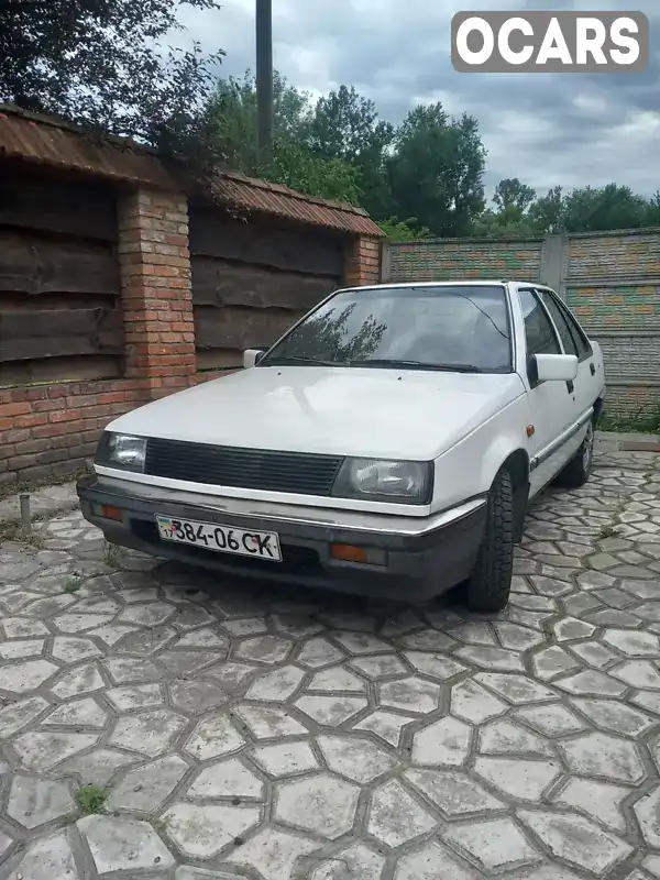 Седан Mitsubishi Lancer 1988 1.5 л. Ручна / Механіка обл. Полтавська, Кременчук - Фото 1/19