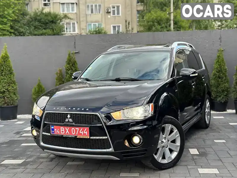 Позашляховик / Кросовер Mitsubishi Outlander XL 2009 2.2 л. Автомат обл. Львівська, Дрогобич - Фото 1/21