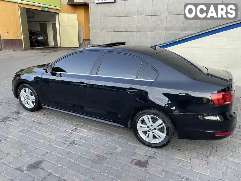 Седан Volkswagen Jetta 2013 1.4 л. Автомат обл. Харківська, Чугуїв - Фото 1/9