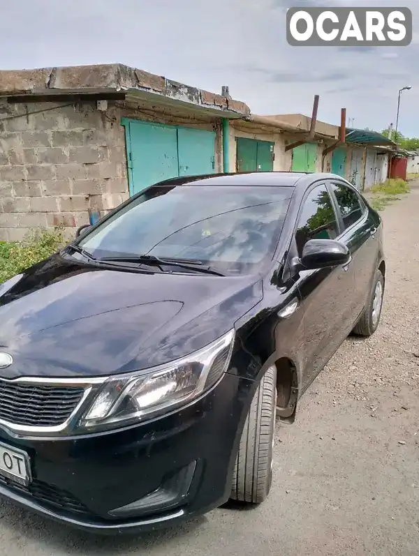 Седан Kia Rio 2013 1.4 л. Ручна / Механіка обл. Донецька, Покровськ (Красноармійськ) - Фото 1/15