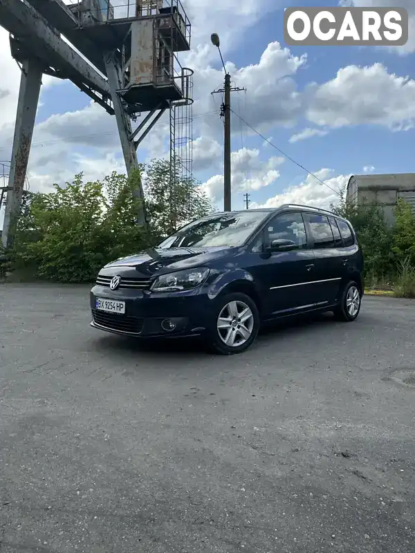 Минивэн Volkswagen Touran 2013 1.97 л. Автомат обл. Хмельницкая, Шепетовка - Фото 1/21