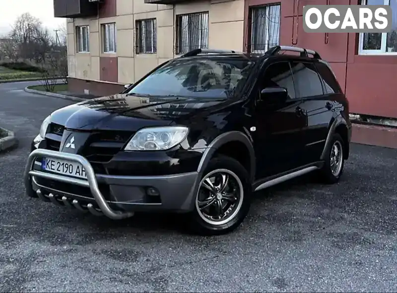 Внедорожник / Кроссовер Mitsubishi Outlander 2005 2.38 л. Автомат обл. Киевская, location.city.piskivka - Фото 1/17