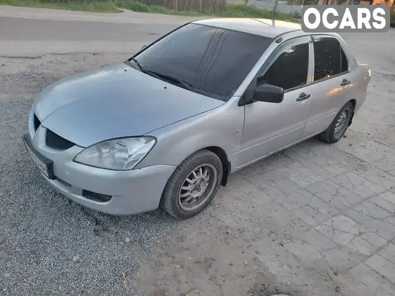 Седан Mitsubishi Lancer 2004 1.3 л. Автомат обл. Житомирська, Бердичів - Фото 1/18