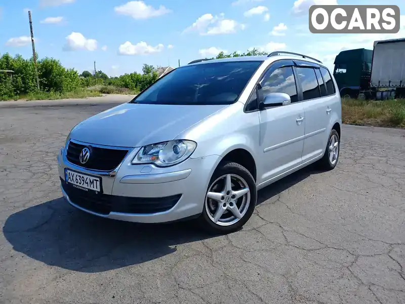 Минивэн Volkswagen Touran 2007 1.9 л. Ручная / Механика обл. Харьковская, Новая Водолага - Фото 1/17