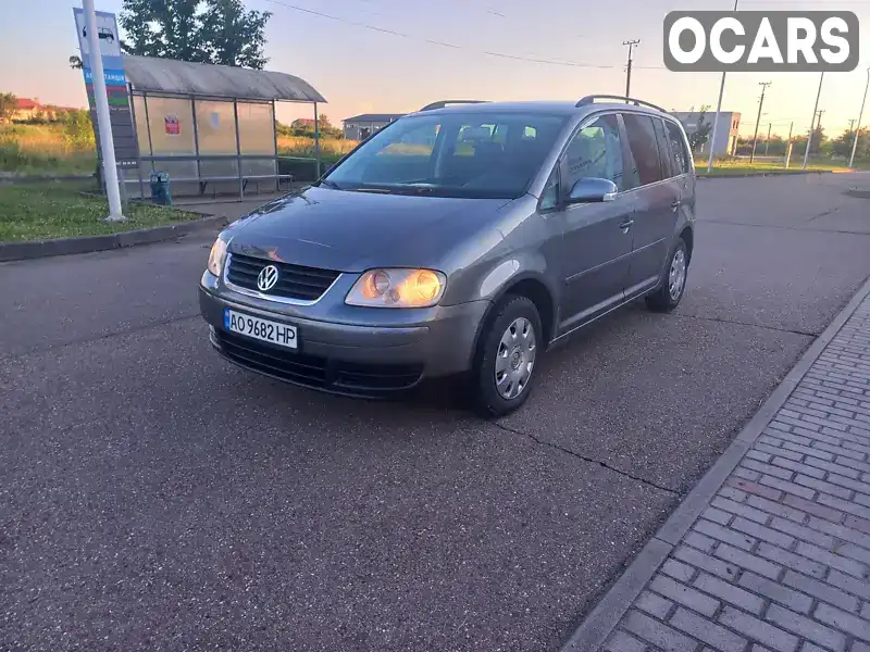 Минивэн Volkswagen Touran 2006 1.9 л. Ручная / Механика обл. Закарпатская, Виноградов - Фото 1/21