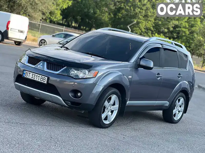 Внедорожник / Кроссовер Mitsubishi Outlander XL 2008 2.4 л. Вариатор обл. Днепропетровская, Днепр (Днепропетровск) - Фото 1/18