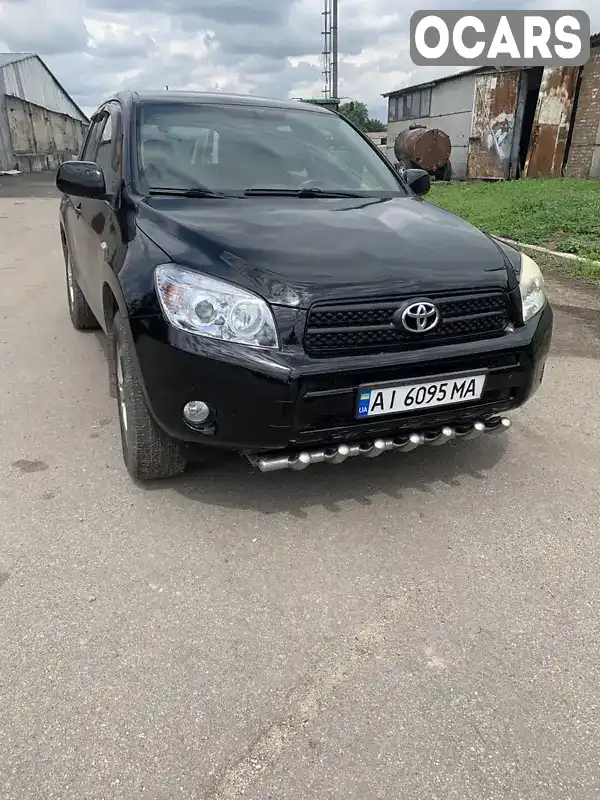 Внедорожник / Кроссовер Toyota RAV4 2006 2 л. Автомат обл. Киевская, Богуслав - Фото 1/7