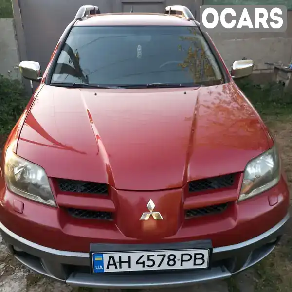 Внедорожник / Кроссовер Mitsubishi Outlander 2004 2.38 л. Ручная / Механика обл. Днепропетровская, Днепр (Днепропетровск) - Фото 1/12