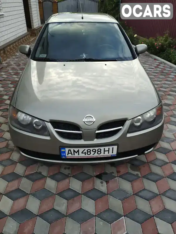 Хэтчбек Nissan Almera 2006 1.5 л. Ручная / Механика обл. Житомирская, Звягель - Фото 1/21