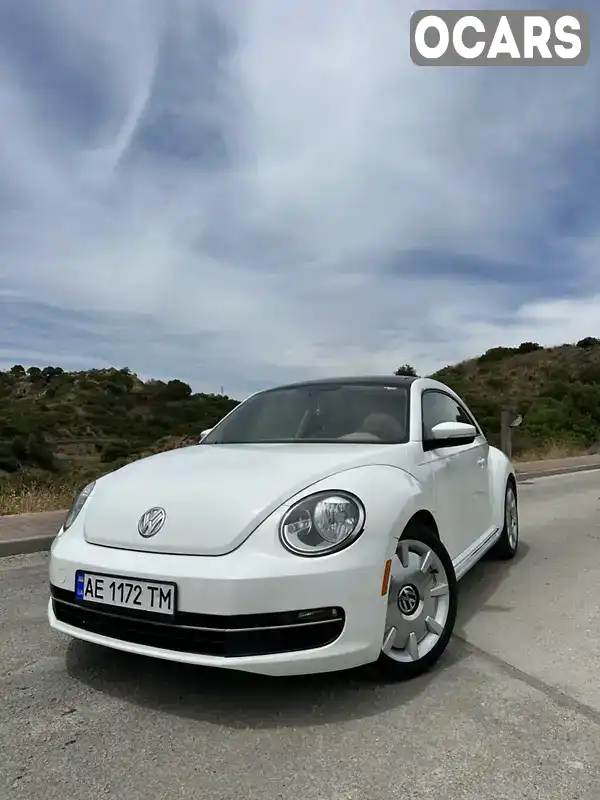 Хэтчбек Volkswagen Beetle 2015 1.8 л. Автомат обл. Днепропетровская, Днепр (Днепропетровск) - Фото 1/21