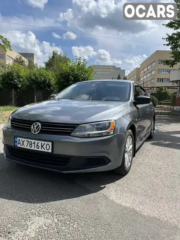 Седан Volkswagen Jetta 2013 1.98 л. Автомат обл. Харківська, Харків - Фото 1/21