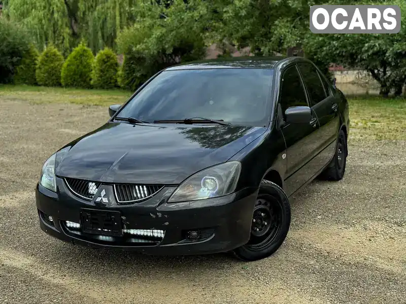 Седан Mitsubishi Lancer 2004 1.6 л. Ручная / Механика обл. Черновицкая, Черновцы - Фото 1/21