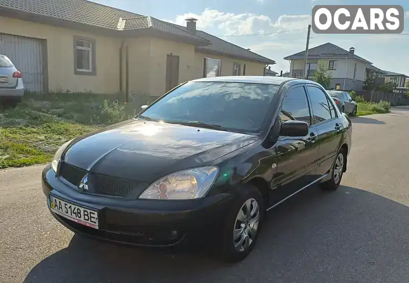 Седан Mitsubishi Lancer 2006 null_content л. Автомат обл. Київська, Київ - Фото 1/9