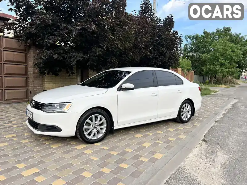 Седан Volkswagen Jetta 2012 2.48 л. Автомат обл. Харківська, Харків - Фото 1/17