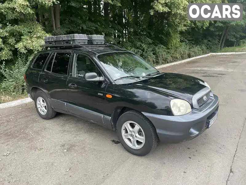 Внедорожник / Кроссовер Hyundai Santa FE 2003 1.99 л. Ручная / Механика обл. Киевская, Вышневое - Фото 1/7