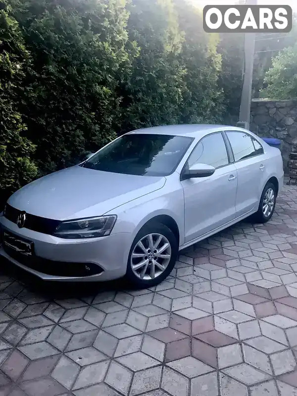 Седан Volkswagen Jetta 2012 1.39 л. Ручная / Механика обл. Запорожская, Запорожье - Фото 1/3