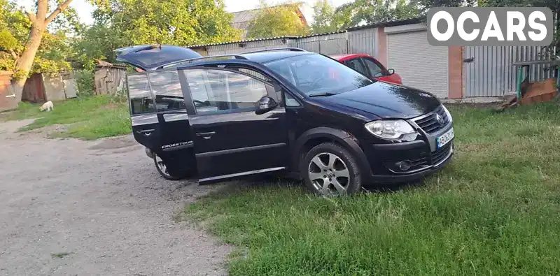 Мінівен Volkswagen Touran 2009 2 л. Ручна / Механіка обл. Вінницька, Чернівці - Фото 1/21