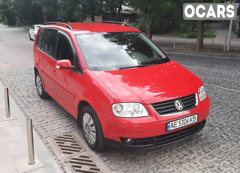 Мінівен Volkswagen Touran 2004 1.9 л. Ручна / Механіка обл. Дніпропетровська, Дніпро (Дніпропетровськ) - Фото 1/12