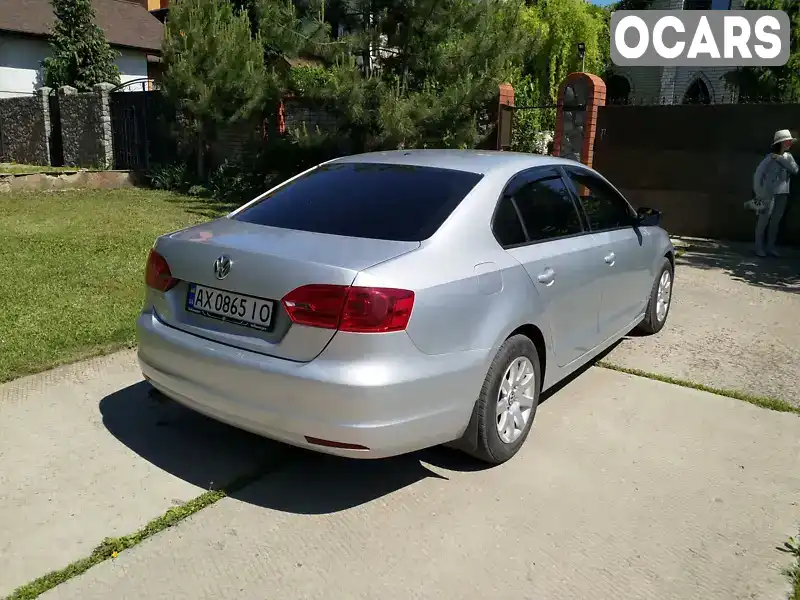 Седан Volkswagen Jetta 2013 1.98 л. Автомат обл. Харьковская, Харьков - Фото 1/21