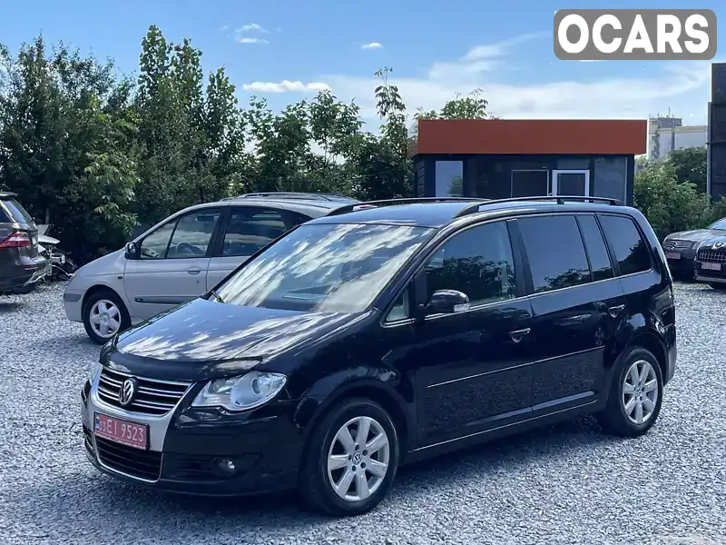 Мінівен Volkswagen Touran 2009 1.4 л. Автомат обл. Рівненська, Рівне - Фото 1/21