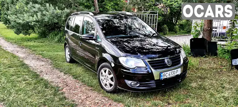 Мінівен Volkswagen Touran 2010 1.39 л. Ручна / Механіка обл. Львівська, Львів - Фото 1/21