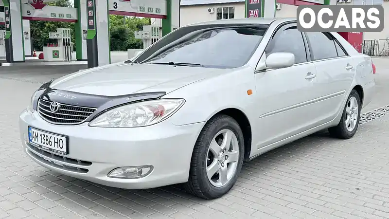 Седан Toyota Camry 2003 2.36 л. Автомат обл. Житомирська, Житомир - Фото 1/21