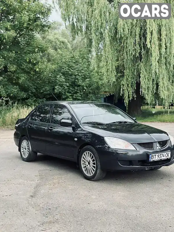 Седан Mitsubishi Lancer 2004 1.6 л. Ручна / Механіка обл. Хмельницька, Хмельницький - Фото 1/11