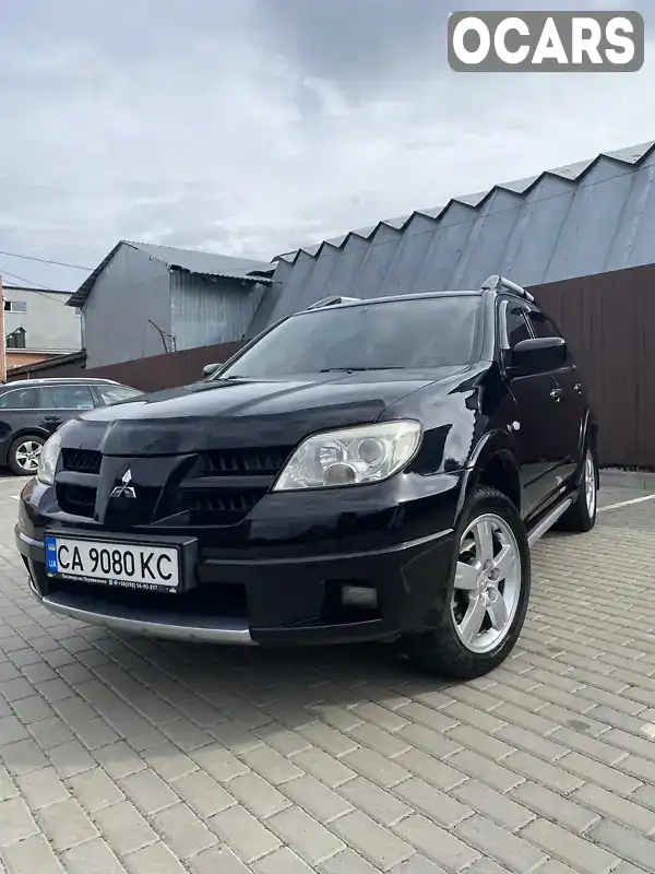 Внедорожник / Кроссовер Mitsubishi Outlander 2006 2 л. Ручная / Механика обл. Черкасская, Черкассы - Фото 1/21