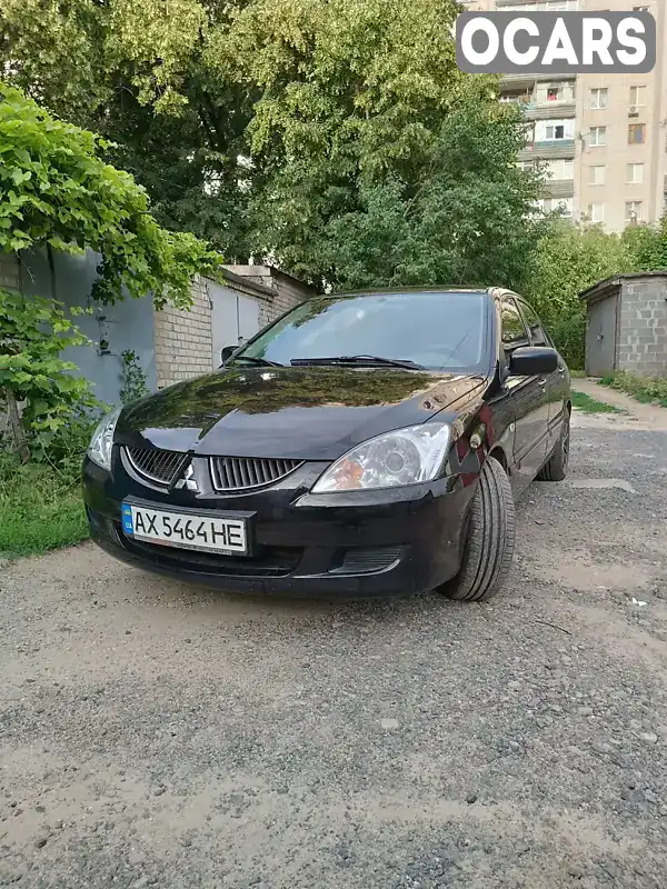 Седан Mitsubishi Lancer 2008 1.58 л. Ручная / Механика обл. Харьковская, Харьков - Фото 1/11